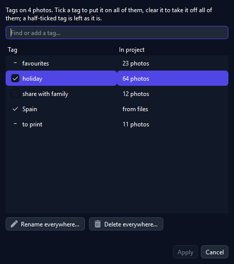 The Edit tags dialog over four selected photos: a find-or-add box above a list of tags, each with a checkbox and a photo count, and Rename everywhere and Delete everywhere buttons